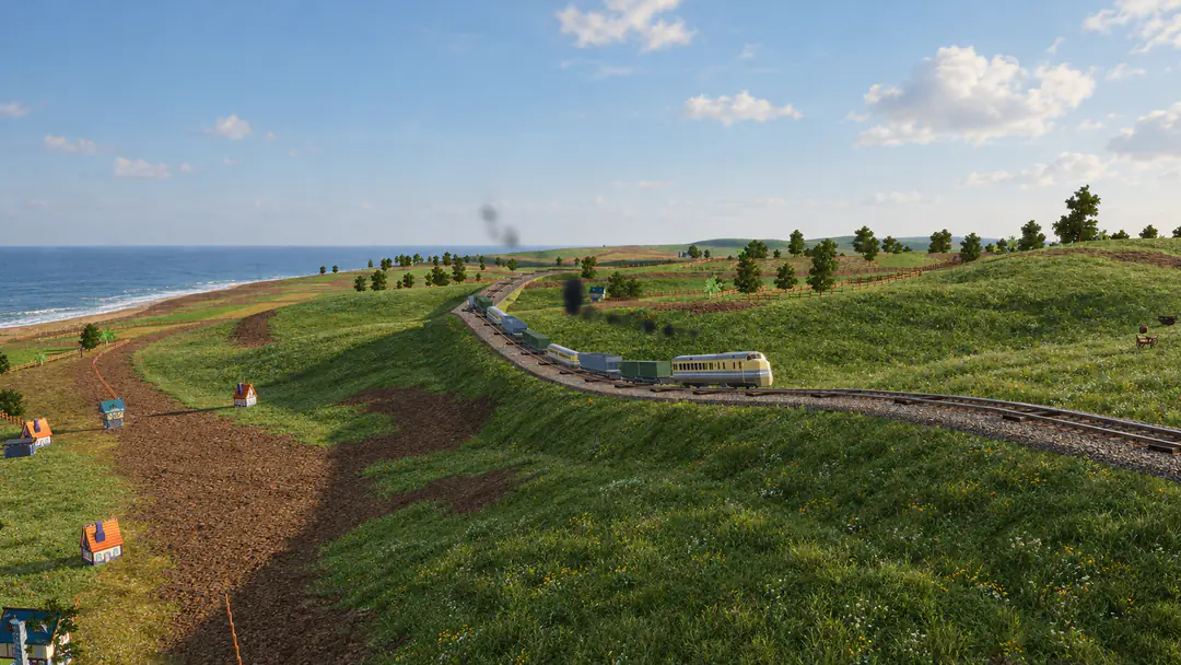 A freight train curving along the Island coast, past fields and small houses, the sea behind