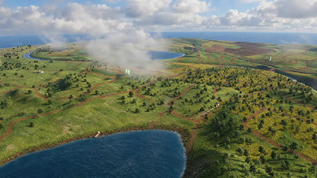 Low cloud drifting over the Island: woods, a lake and the river winding towards the coast